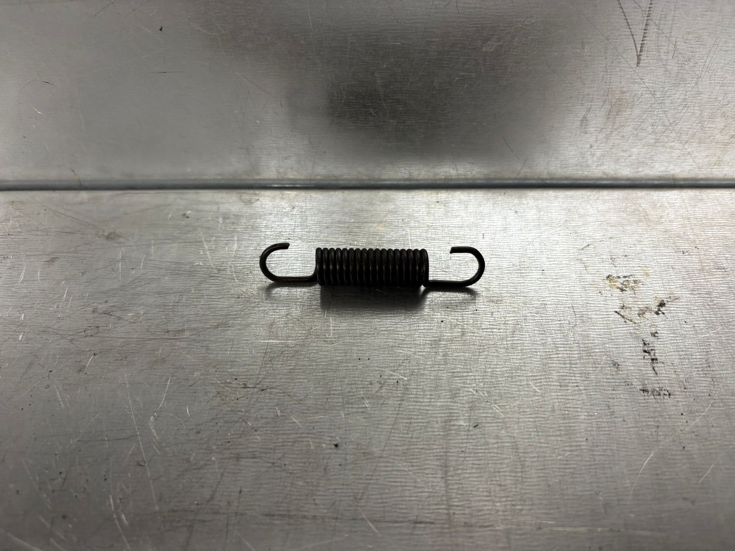 INNER RETURN SPRING