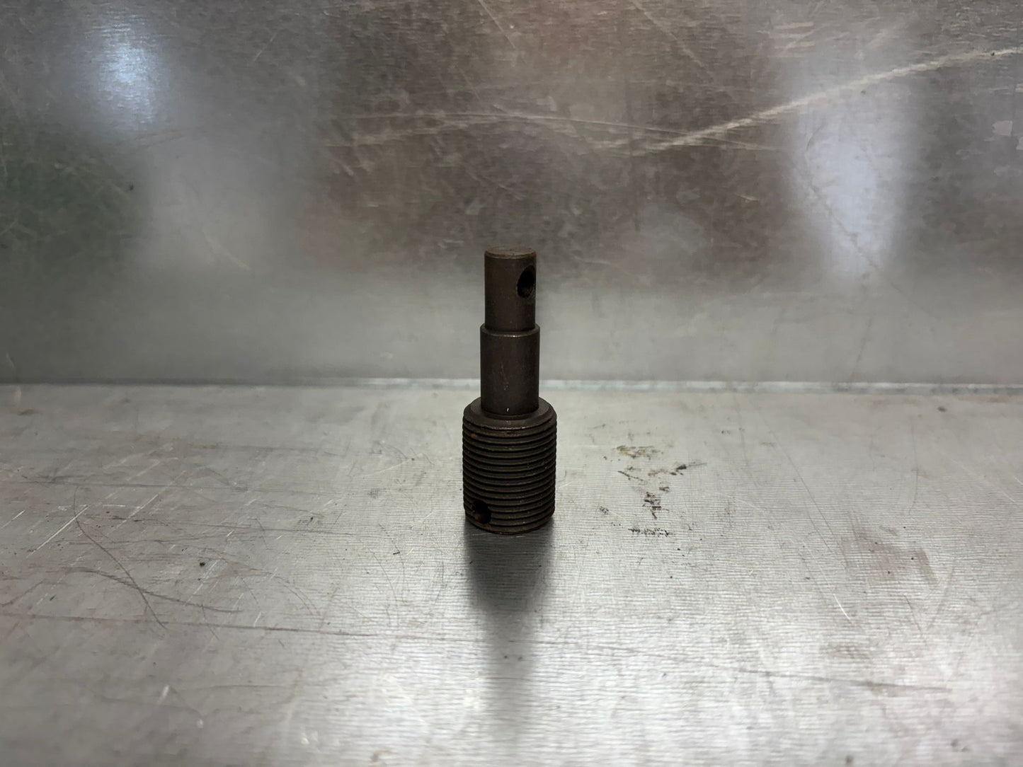 LOWER TOP OF ADJUST VALVE