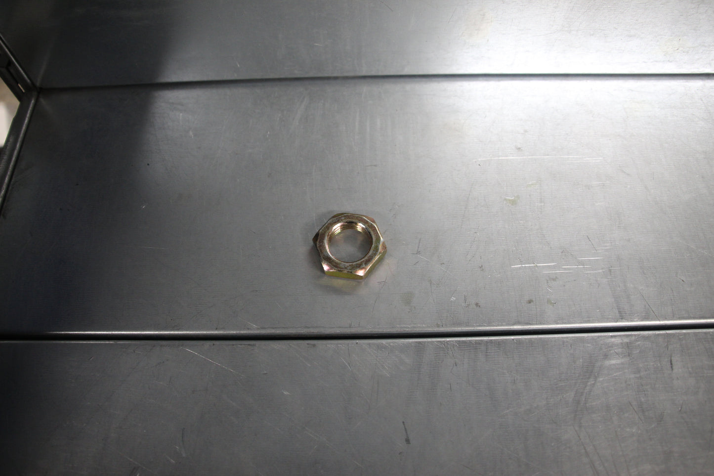 HEX. NUT M24X2 LEFT THREAD